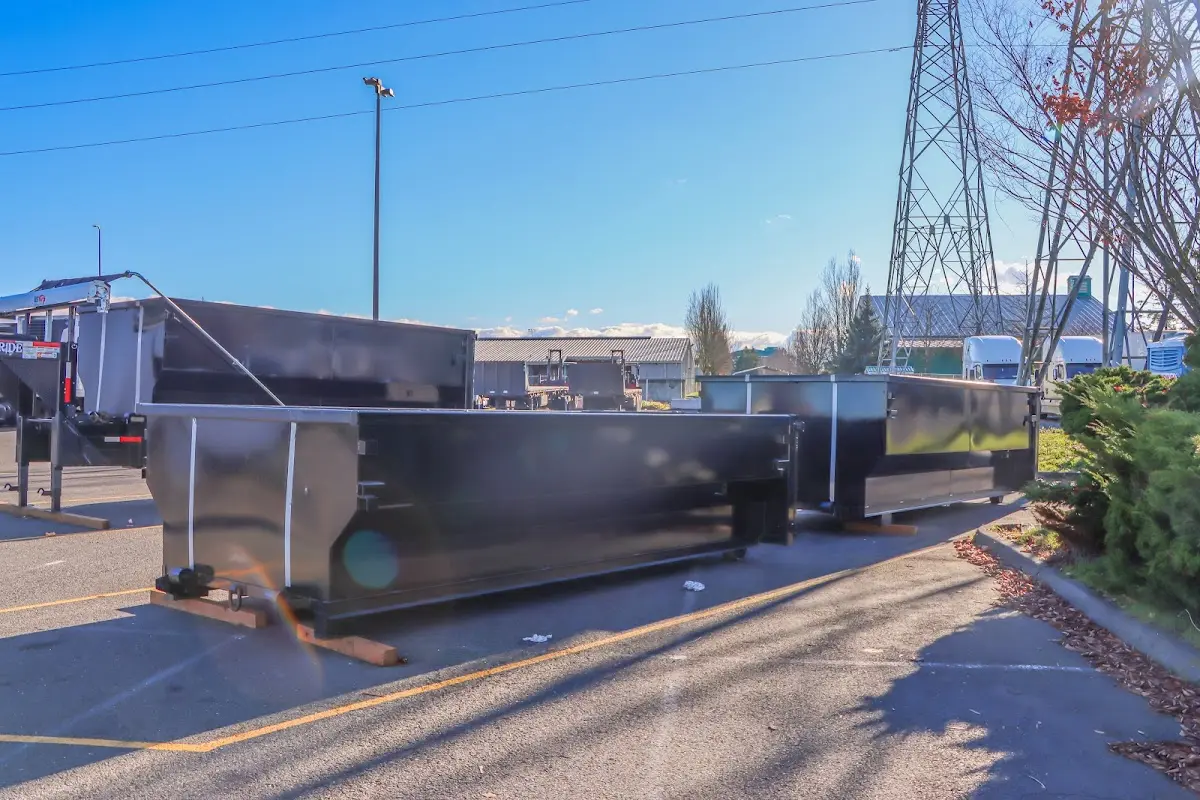Roll-off dumpster ready for waste disposal at job site for Cleanout Dumpster Rental in Grand Rapids